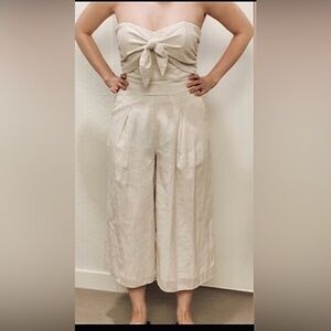 Anthropology Vera jumpsuit Cropped Wide Legs Front Bow Tie cream color size XS